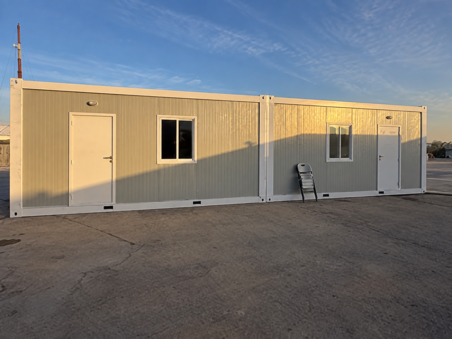 Long connected flat-pack building elevation
