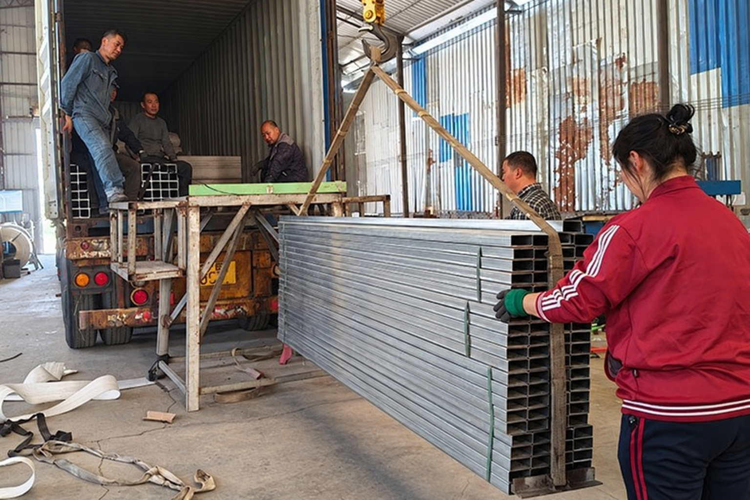 Archived reference image of steel components being prepared for shipping
