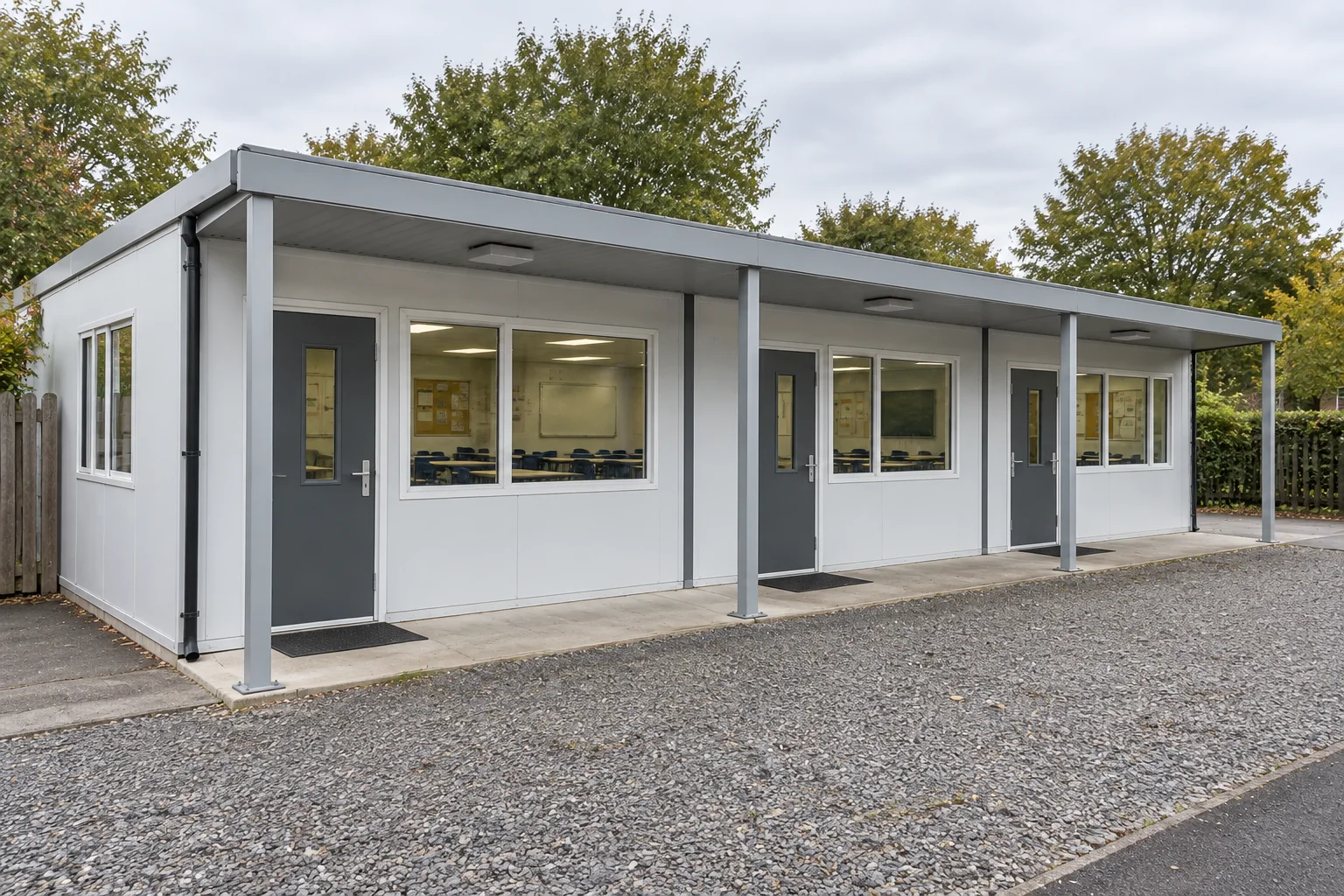 Connected modular teaching rooms with separate entrances and a covered walkway