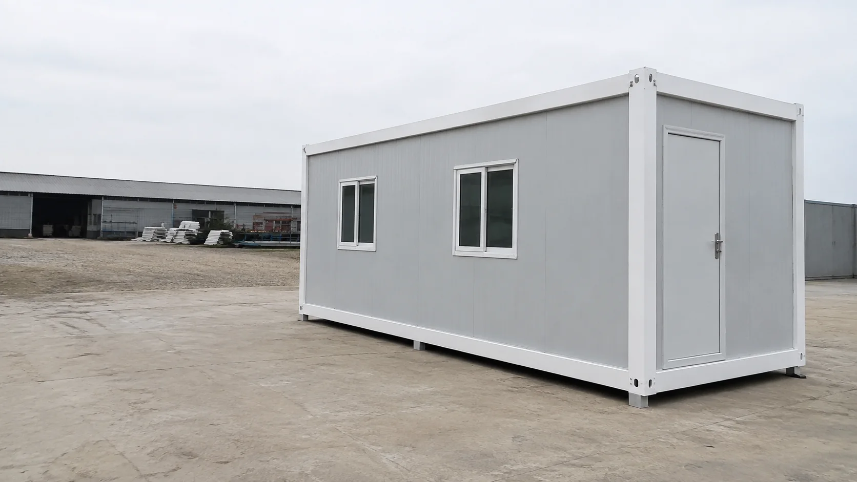 Illustrative detachable container house assembled from frame members and wall panels
