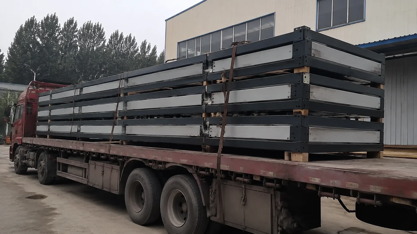 Illustrative protected folded cabin packages prepared for transport.