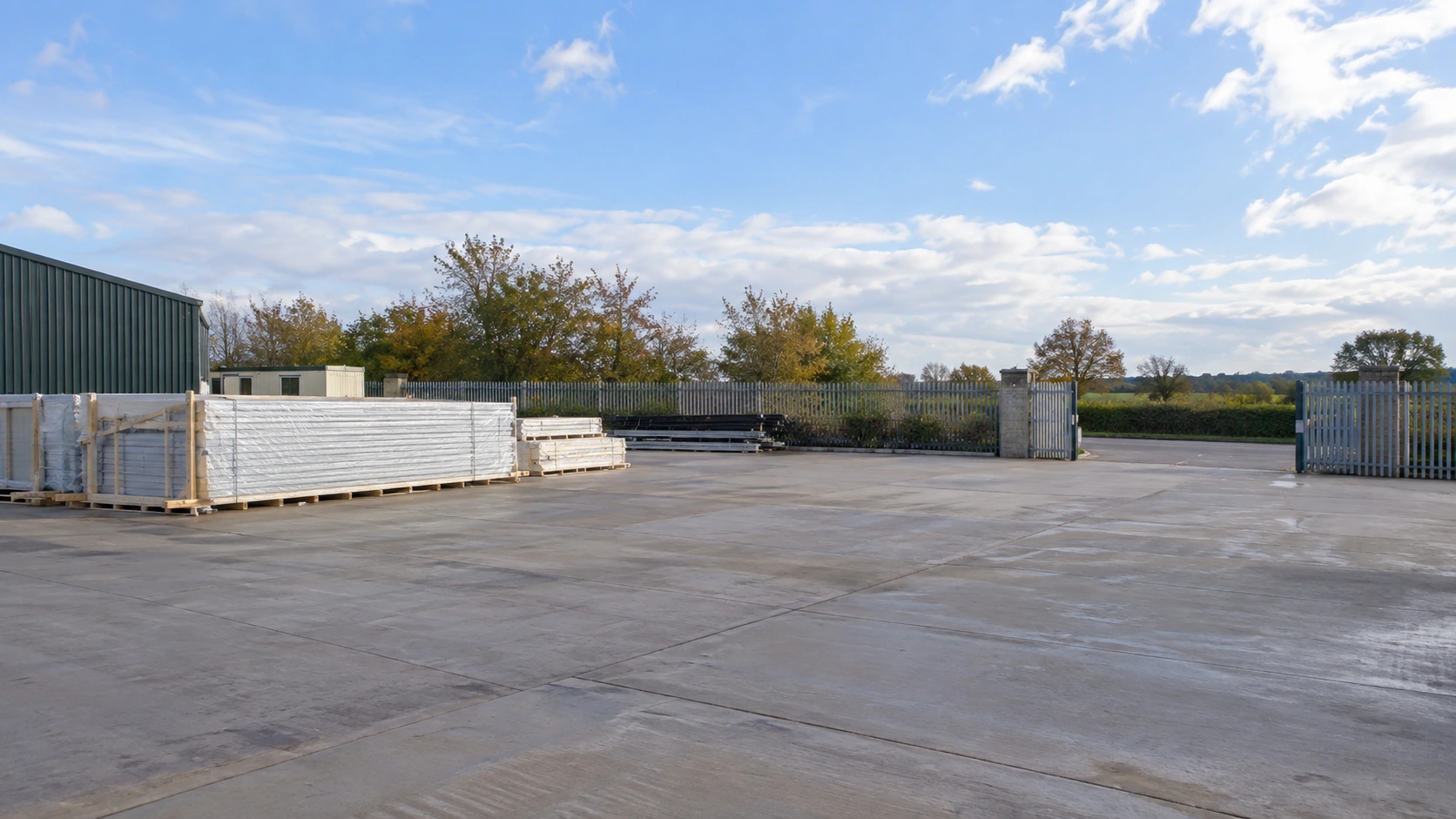 New concept illustration of a prepared open installation area beside a compact protected building package.