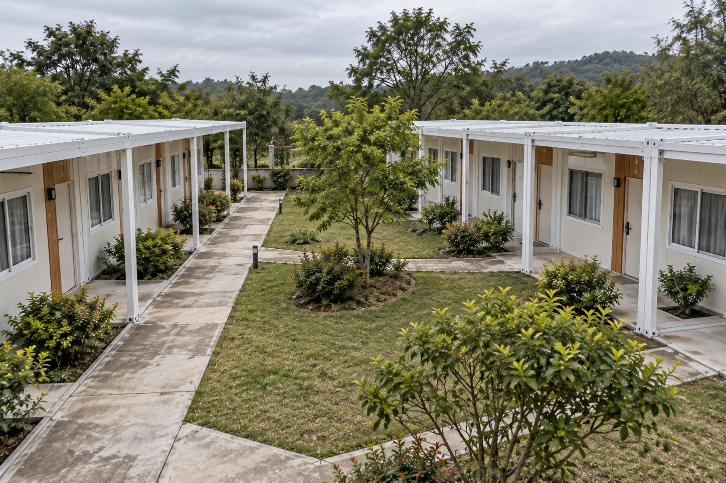 Low-rise hotel courtyard layout concept with two guestroom wings