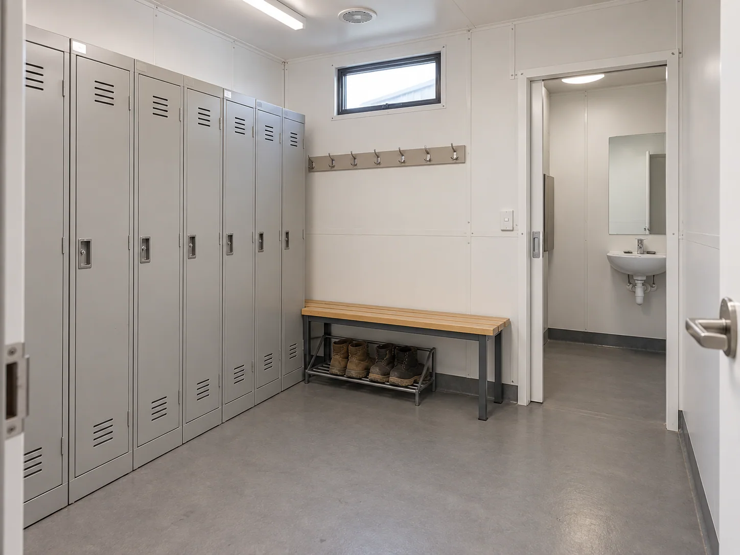 Concept changing area with lockers, benches and work-boot storage