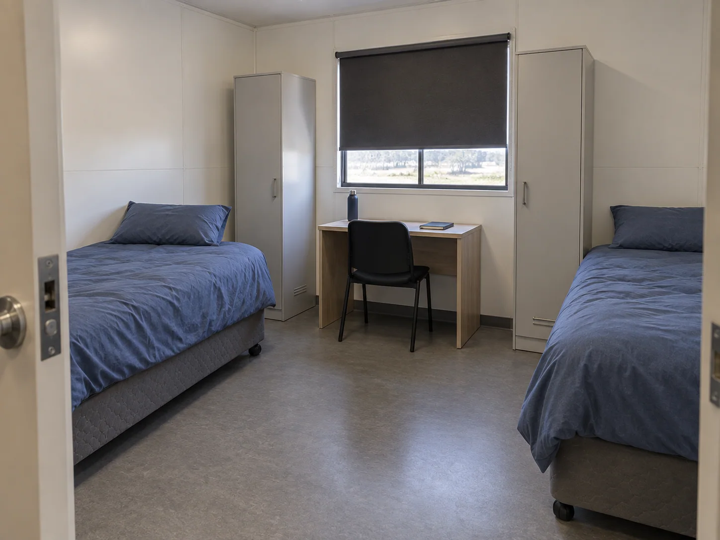 Concept twin mining camp room with separate beds and personal storage