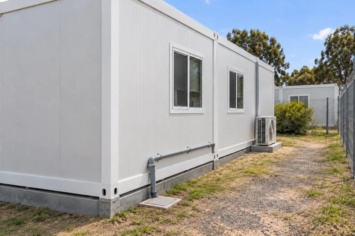 Modular building service-side pipework and maintenance path