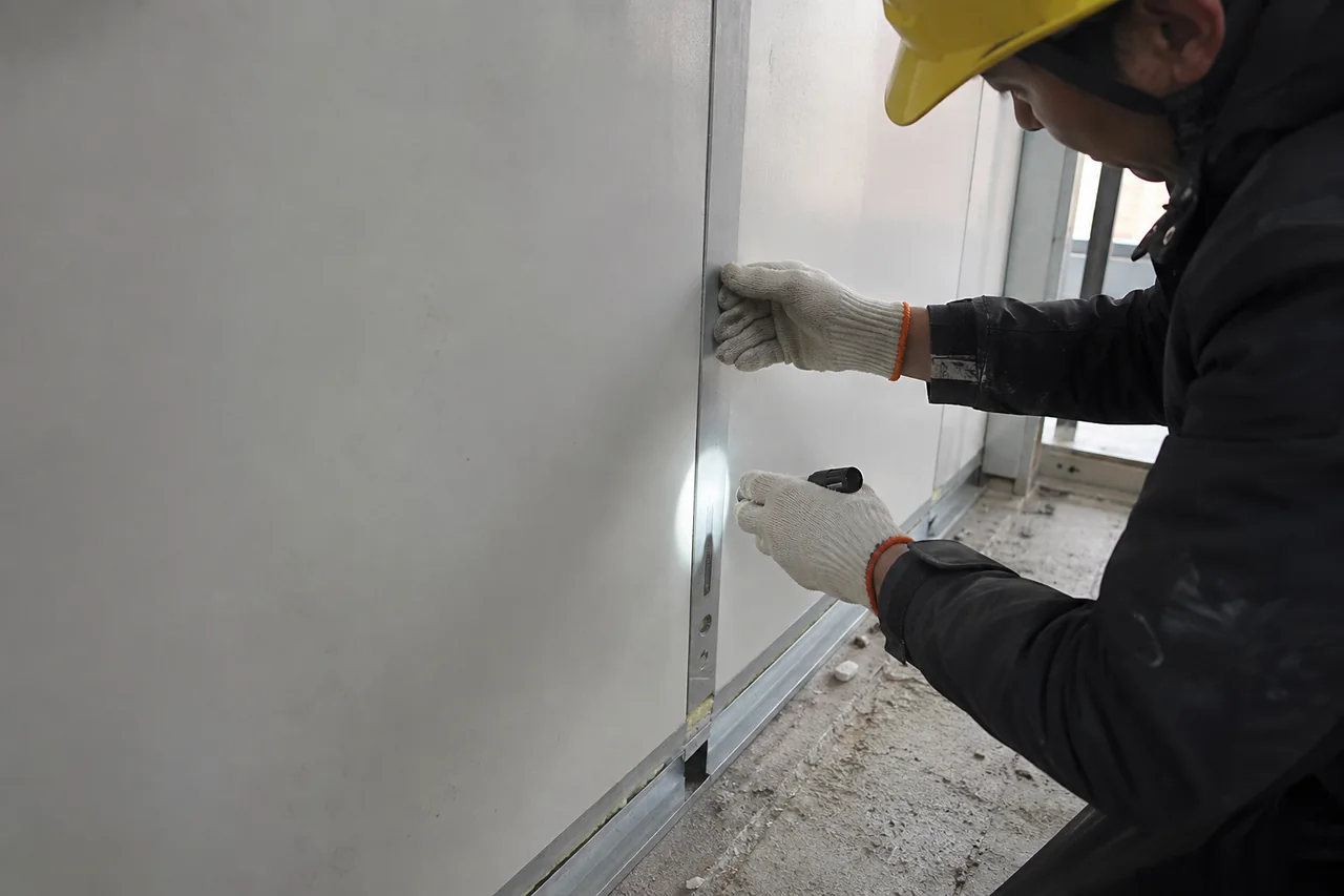 panel joint inspection — illustrative process scene