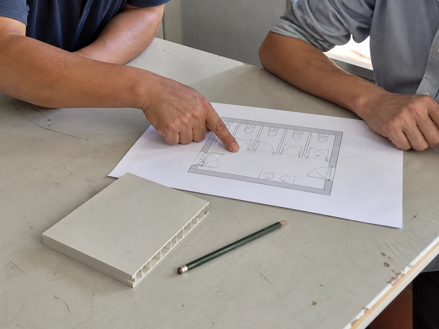 Illustrative review of a sanitary unit layout and fixture selections