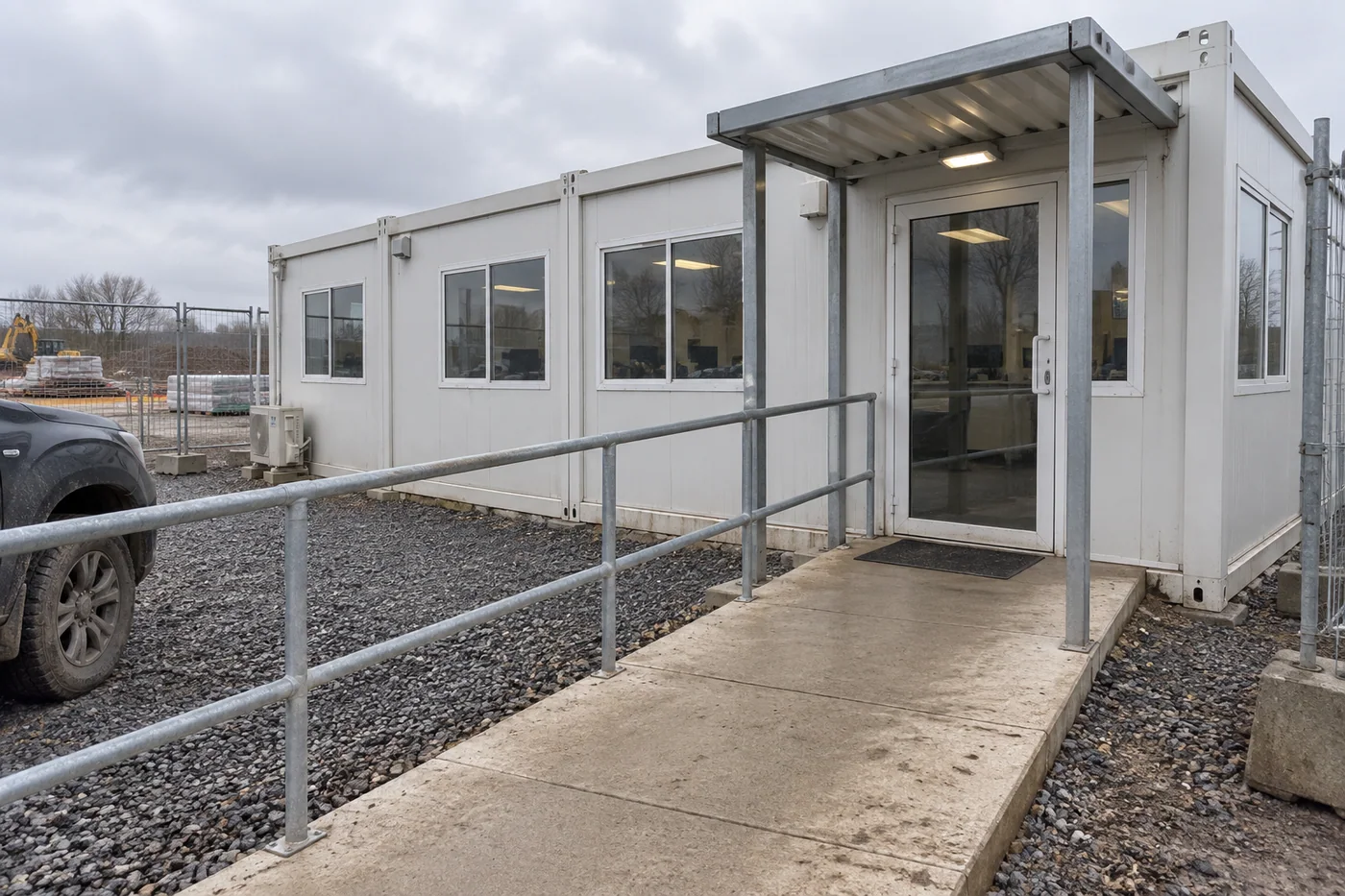 Defined pedestrian approach to a modular site office reception entrance