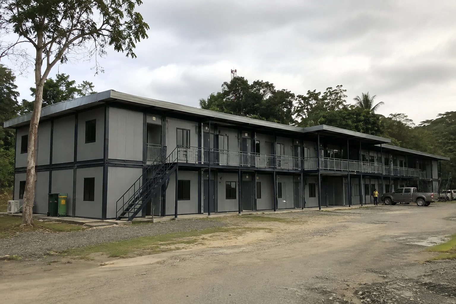 Two-storey modular building with an upper walkway and exterior stairs