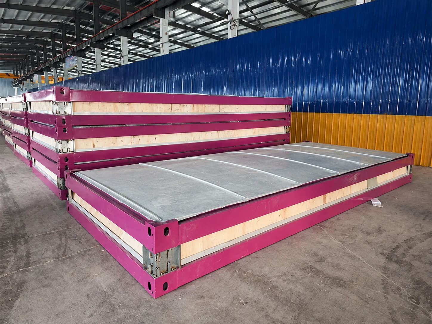 Workshop reference showing pink module frames and a floor assembly