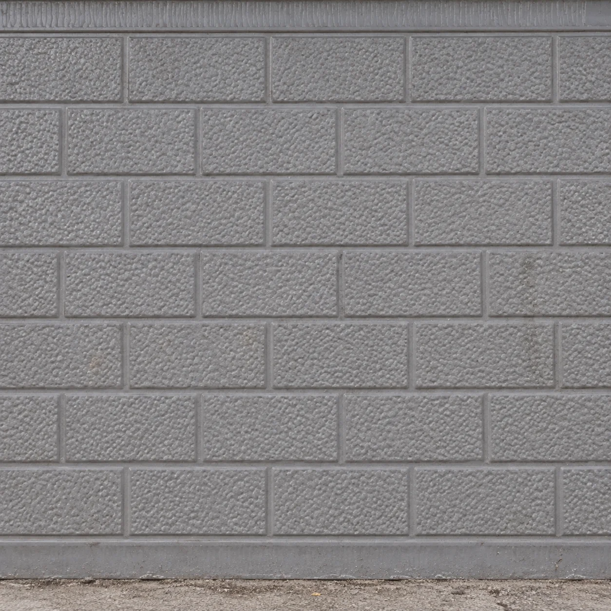 Reference light grey brick-pattern exterior panel