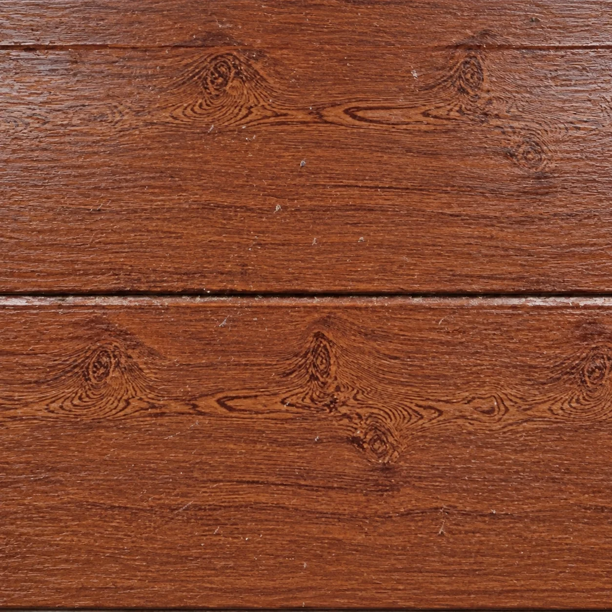 Reference brown wood-pattern panel with visible knots