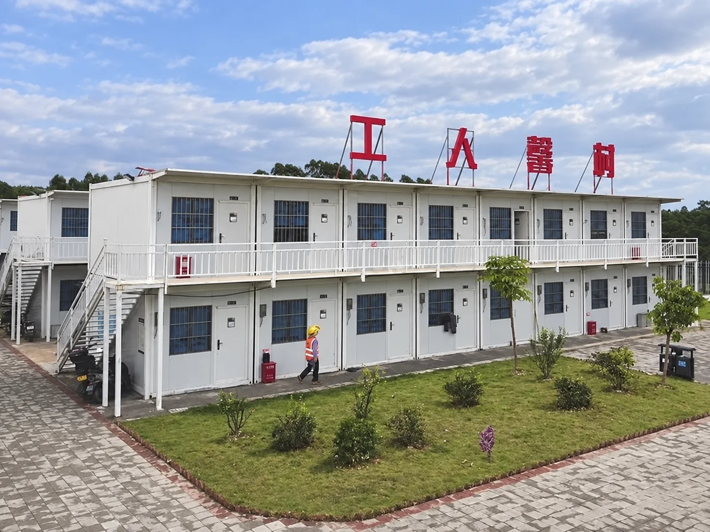 Reference white two-storey modular building with exterior walkways