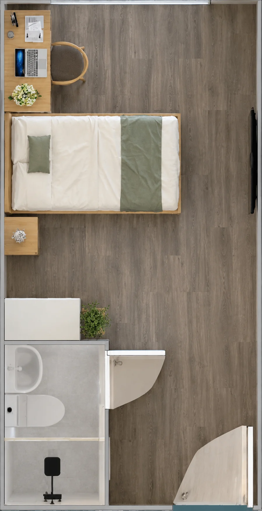 Vue de dessus d'une chambre avec un lit simple, un bureau et une salle de bain séparée. Référence de conception.