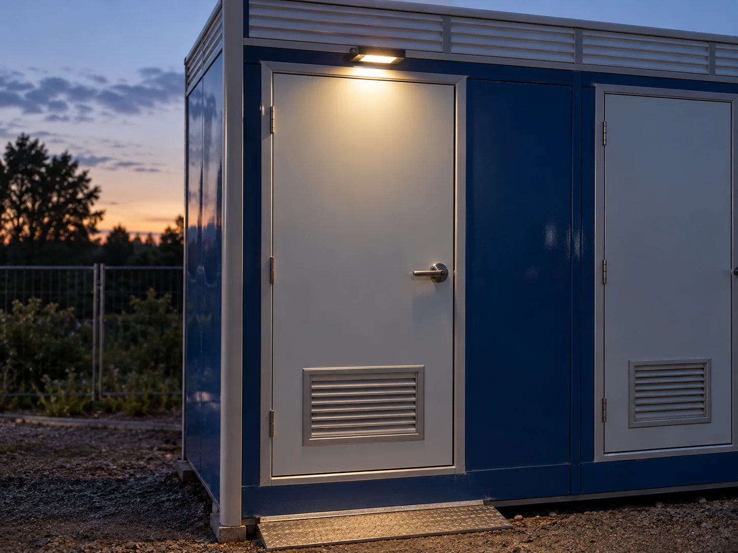 A closed sanitation door with a visible ordinary handle and nearby light
