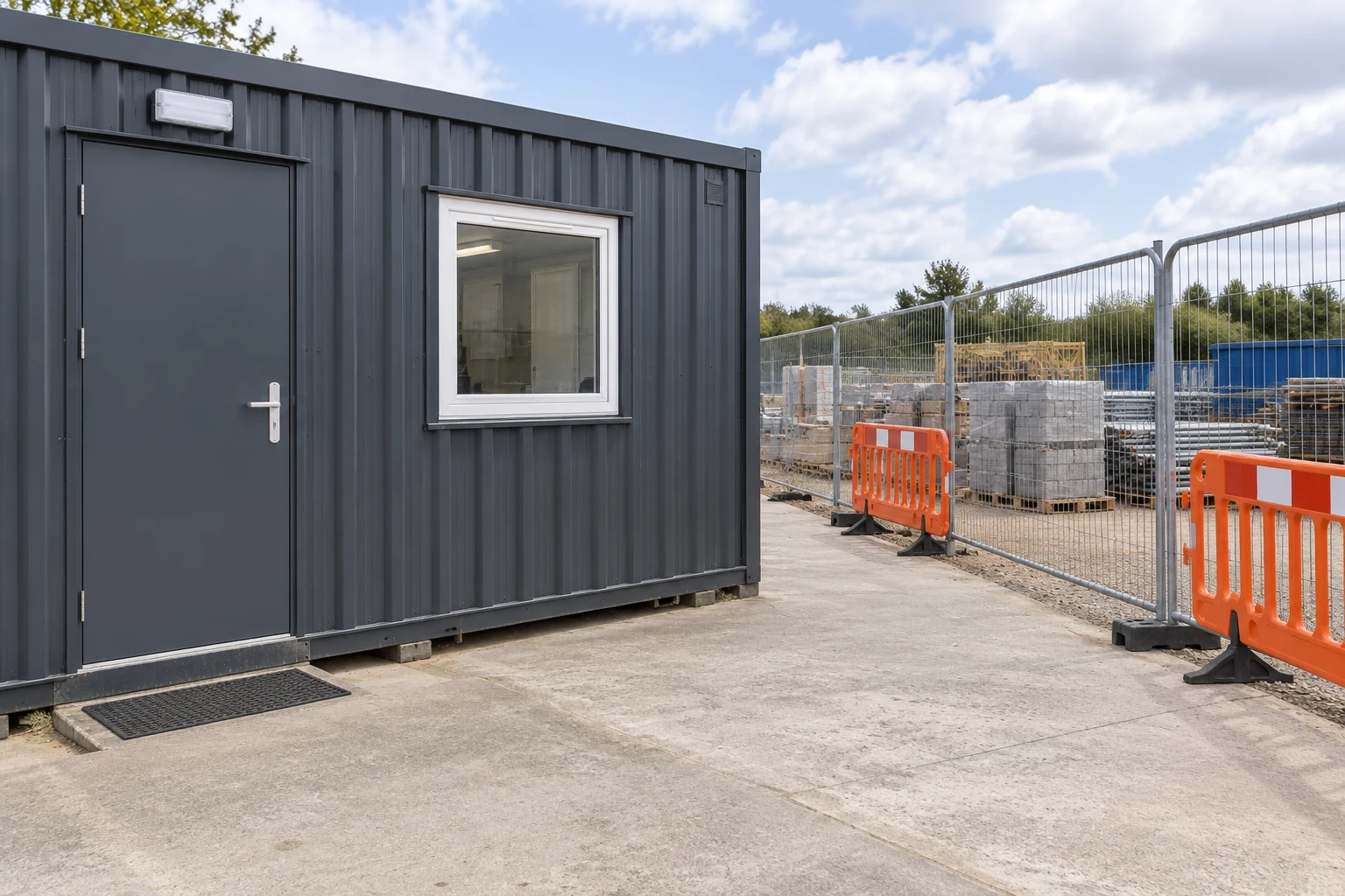 A temporary work boundary is separated from the occupied office entrance.